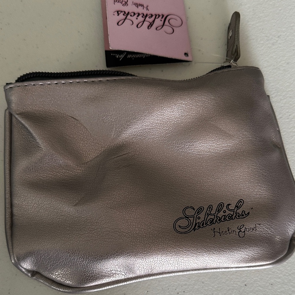 Sidekicks folding slippers in pouch.